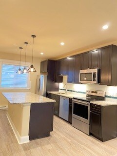 Full Kitchen with stainless steel appliances. - 2708 Ironton St