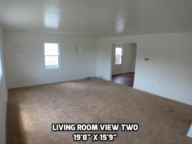 Building Photo - Three bedroom home excellent neighborhood