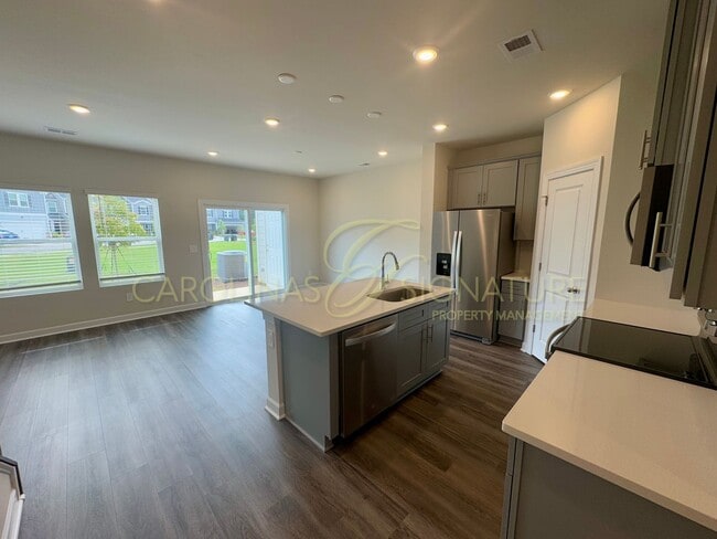 Building Photo - Beautiful New Construction Townhome in Uni...