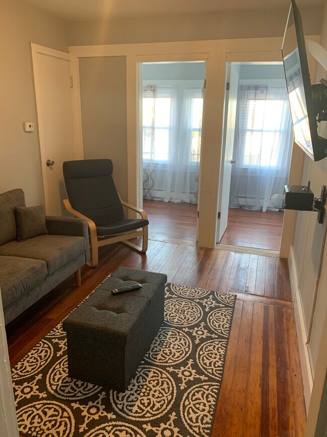 Livingroom/sunrooms (right door) - 699 Nantasket Ave