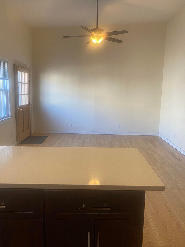 Living room from kitchen - 100 Reservoir Ave