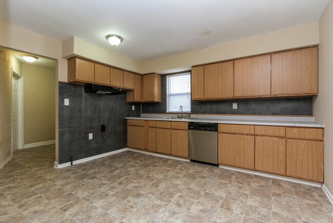 Building Photo - Three Bedroom Now Available