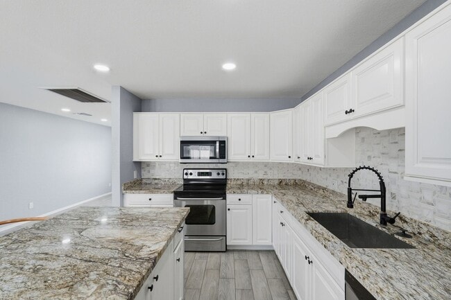 Building Photo - Recently Remodeled Home with All Appliances Included!
