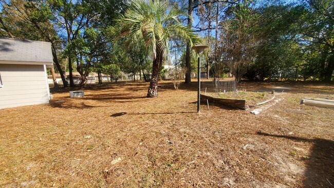Foto del edificio - Large 3 Bedroom, 2.5 Bath with large Den and Family Room in Rainbows End, Dunnellon, FL