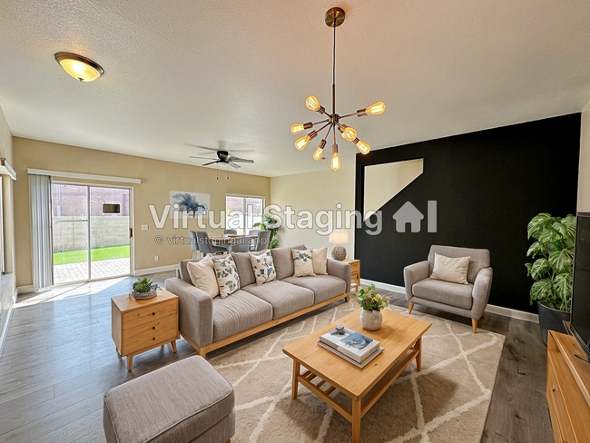 Building Photo - 3 BEDROOM TOWNHOME WITH YARD + 2 CAR GARAG...