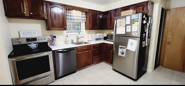 Kitchen with stainless steel appliance - 9177 Collington Sq