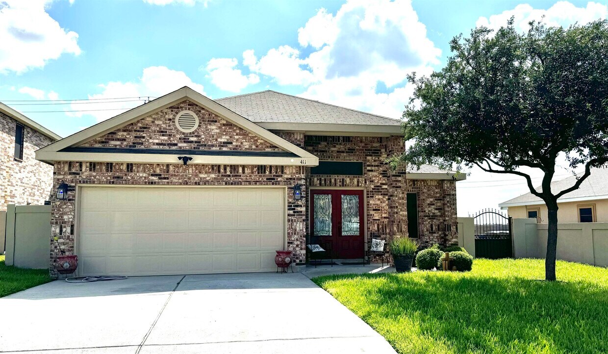 Foto principal - 411 Windmill Palm Dr
