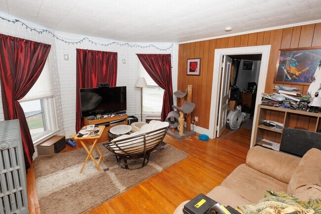 Living Room with bay window. Comes not furnished! - 39 Homer Ave