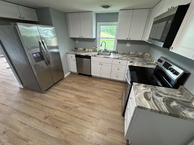 Foto del edificio - 6117 Carpenter Bridge Rd