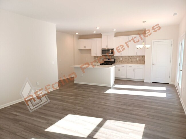 Building Photo - Modern 3 Bedroom 2-Car Garage House with L...