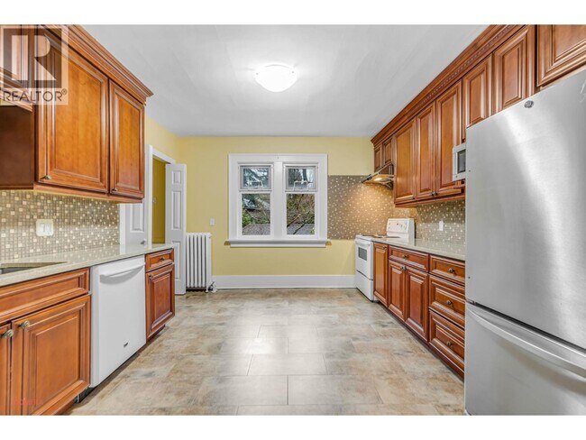 Photo du bâtiment - 1488 W 33rd Ave