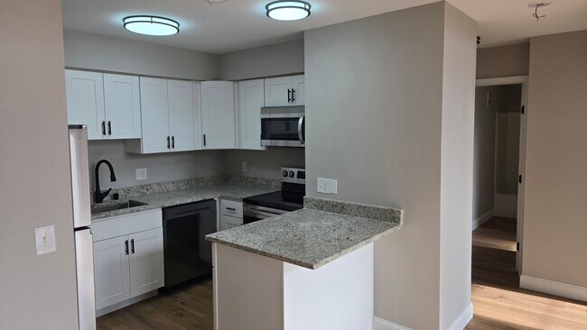 Cocina recién reformada - Homestead Court Townhomes