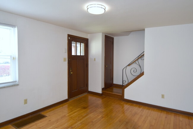 Entry & stairs to second level (with coat closet) - 3004 Willett Rd