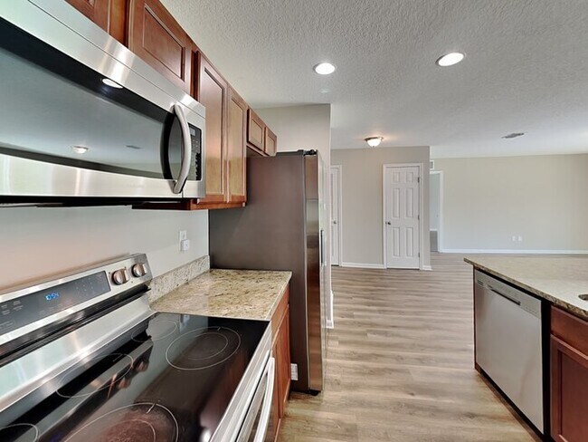 Foto del edificio - 7063 Camfield Landing Dr