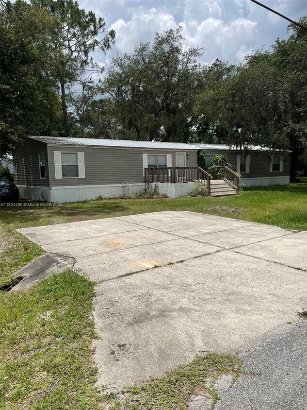 Foto principal - 8638 Gibson Oaks Dr