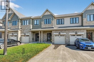 Building Photo - 936 Eileen Vollick Cres