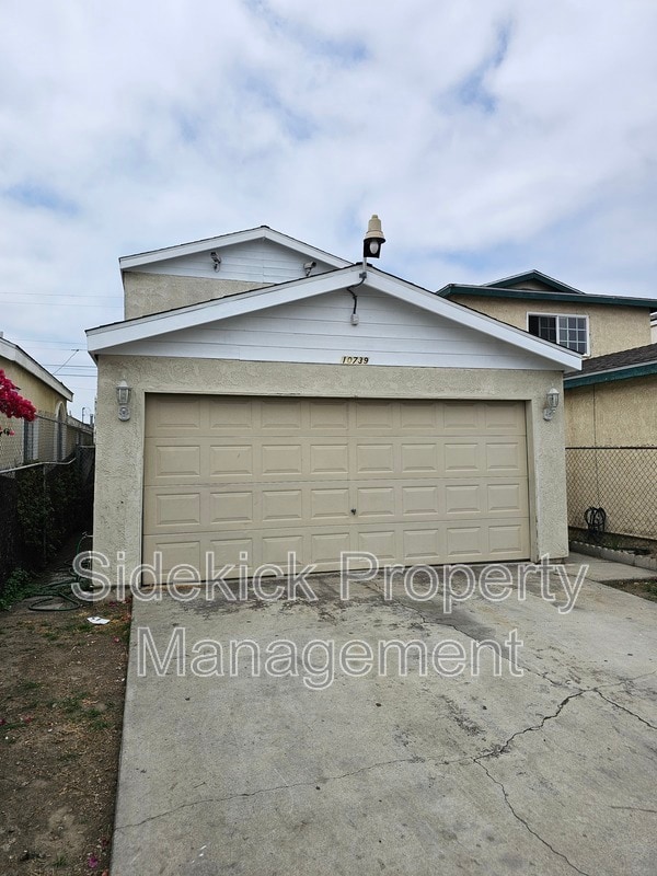 Building Photo - 10739 Mona Blvd