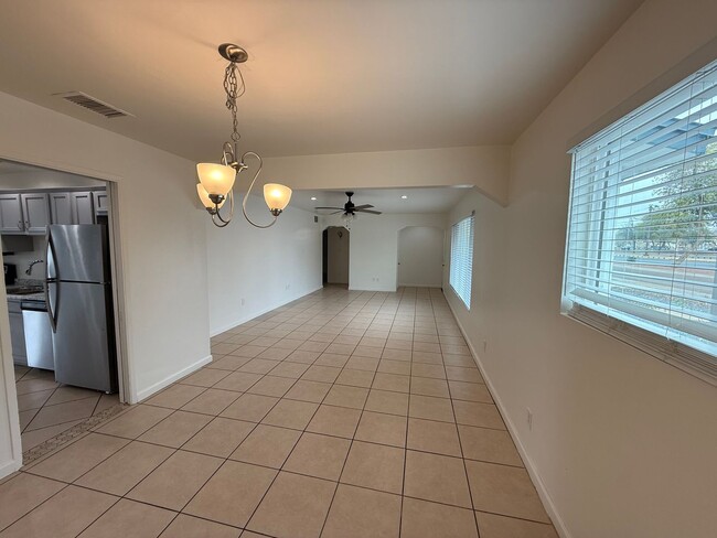 Photo - 4 Bedroom Home with Large Backyard | Modern Landscaping | Utilities Included