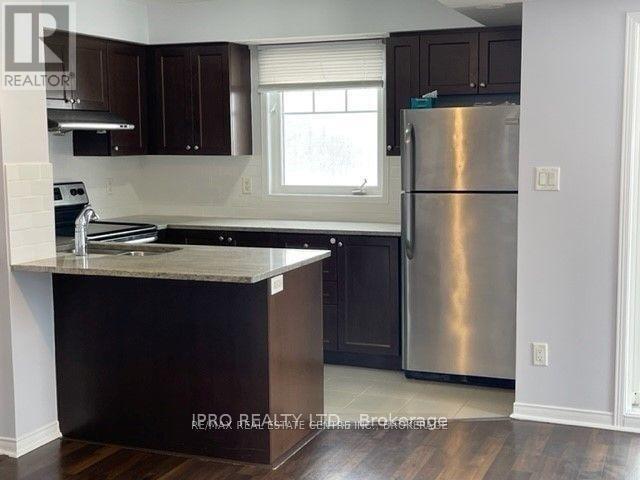 Photo du bâtiment - 5625-5625 Oscar Peterson Blvd