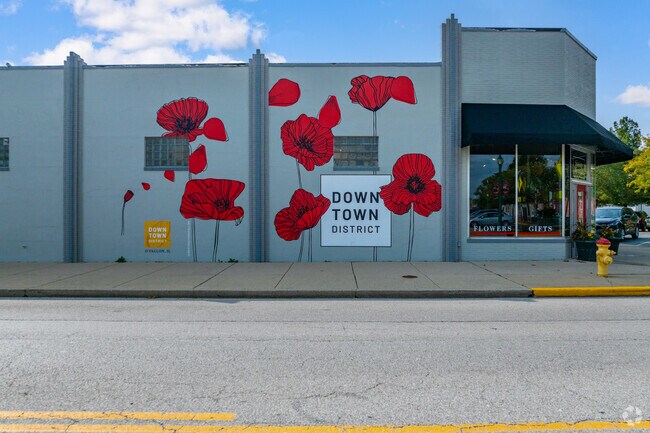 A mural welcomes visitors to the downtown district.