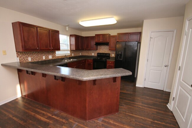 Building Photo - Spacious 4BR Home in Robin's Ridge with Soaring Ceilings, Guest Suite & Two-Car Garage