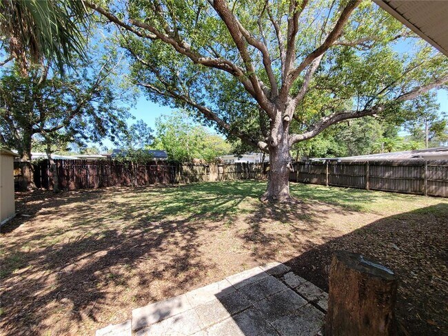 Building Photo - 7366 Royal Palm Dr