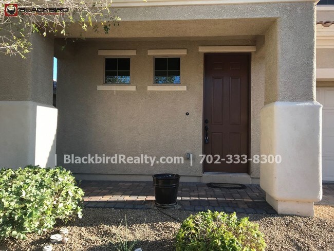 Building Photo - Rhodes Ranch  4 Bedrooms Pool  Guard Gated