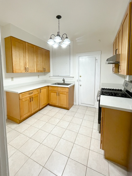 Kitchen with updated cabinets and countertop - 1017 Hyde St