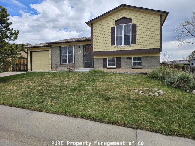 Photo - Tri-level home with central air and 1-car garage
