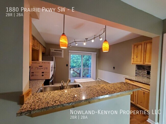 Foto del edificio - 1880 Prairie Pkwy SW - E- 2 beds, 1 full bath