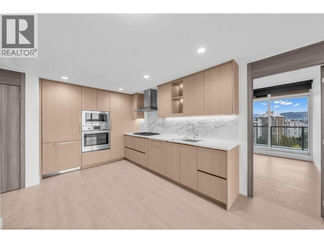 Building Photo - 4890 Lougheed Hwy.