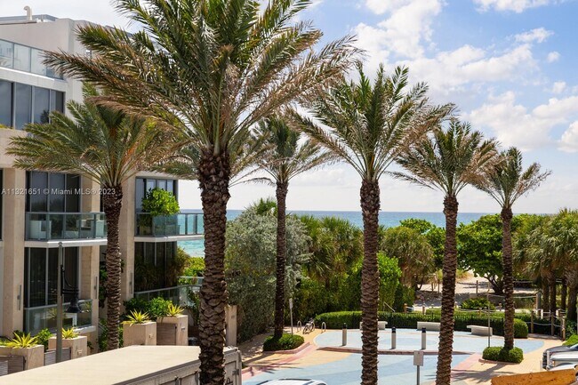 Building Photo - 9499 Collins Ave