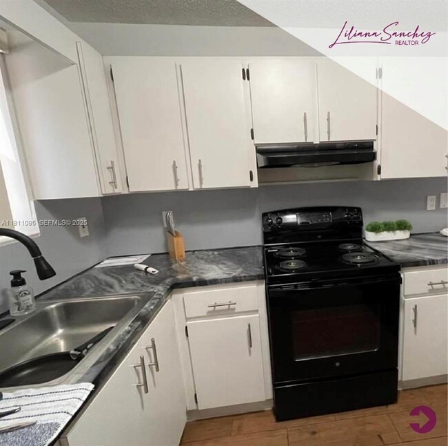 Building Photo - 7755 W 30th Ct