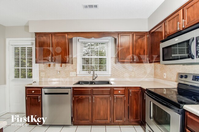 Foto del edificio - 5807 Running Ridge Rd