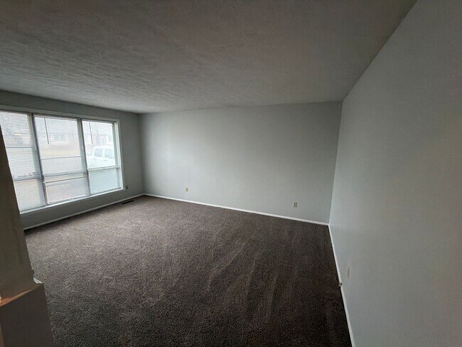 Building Photo - You’re here. You’re home. You’re happy.