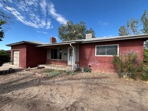 Building Photo - 1601 N Chaco Ave