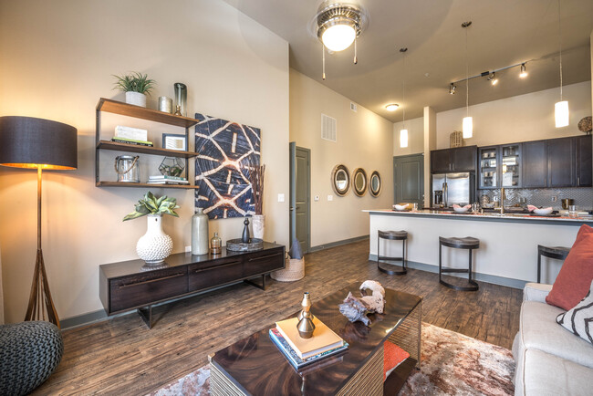 Living room with ceiling fan - Avalon Lakeside