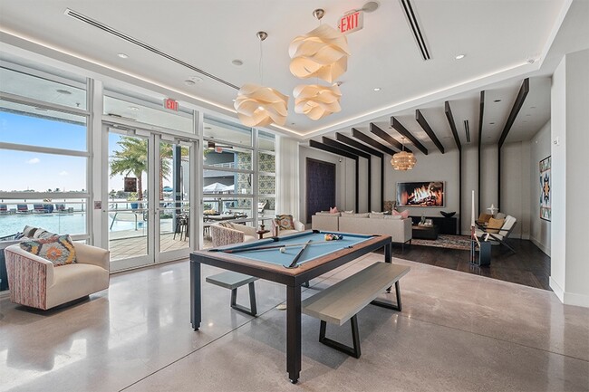 Our two-story lakefront clubhouse features TVs, billiards and an entertainment kitchen - LaVida Apartments