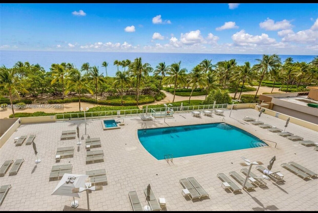 Building Photo - 10185 Collins Ave