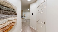 This well-appointed one-bedroom, one-bathroom unit in Boone, NC offers a thoughtfully designed layout across a single floor. Light hardwood-style flooring flows throughout the space, complemented by crisp white walls that create a bright, clean aesthetic.

The heart of the unit is a combined kitchen, dining, and living area. The kitchen features white shaker-style cabinetry, granite countertops, stainless steel appliances including a range and built-in microwave, and a curved peninsula with bar seating — ideal for casual dining. A dedicated pantry and double closet provide generous storage. The open living area accommodates comfortable seating and benefits from multiple windows that allow natural light to fill the room, enhanced by a ceiling fan overhead.

The bedroom is a comfortable, well-sized retreat with dual windows, a ceiling fan, and direct access to a closet. Its layout easily accommodates a full furniture arrangement. The full bathroom includes a tub-shower combo, a single-sink vanity with white cabinetry, and coordinating light flooring.

A welcoming entry hallway connects all areas of the unit efficiently. With two closets and a pantry, storage is a practical highlight of this Boone residence.