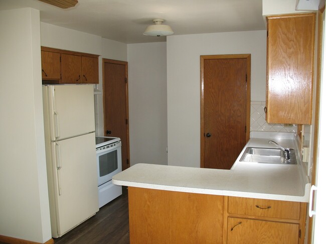 fridge and gas ranger included - 1317 E 28th St