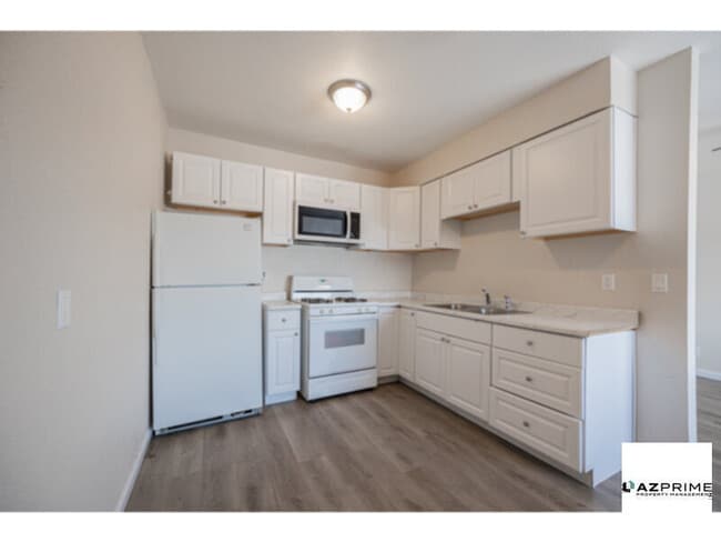 Building Photo - Enjoy Practical Comfort in This Thoughtful...