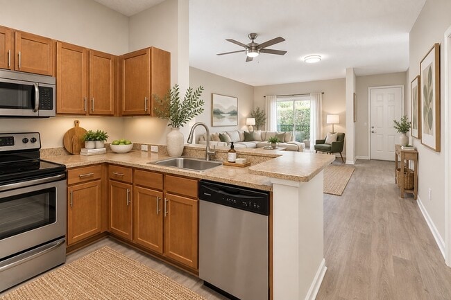 Adéntrate en la elegante modernidad de Delray Bay. Esta espaciosa cocina cuenta con electrodomésticos modernos, amplio espacio de almacenamiento y un ambiente acogedor, ideal para los amantes de la cocina. ¡No pierdas la oportunidad de hacer de esta tu casa hoy mismo! - Delray Bay Apartments