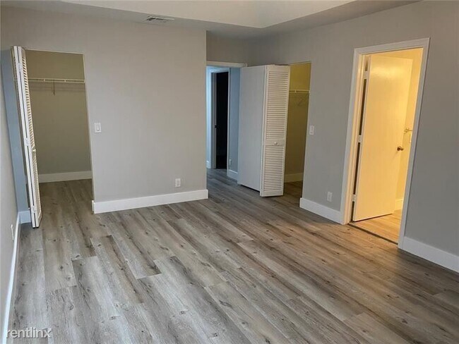 Building Photo - 4 br, 2.5 bath House - 10657 NW 1st St