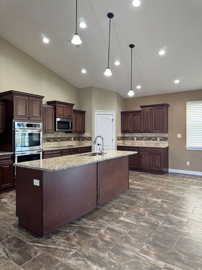Building Photo - Executive 4-Bedroom Home for Rent