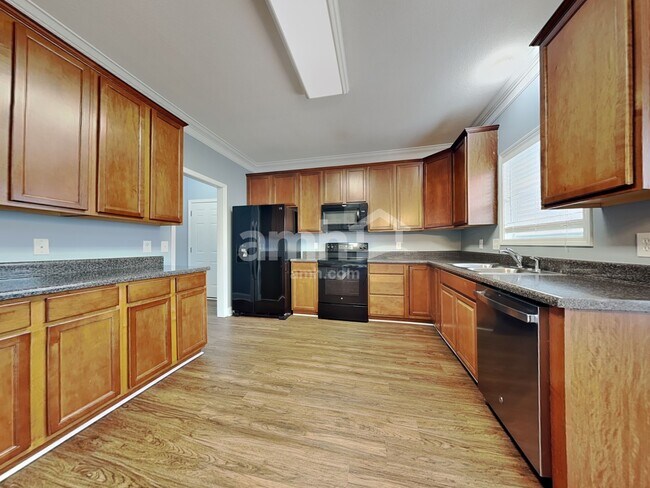 Foto del edificio - 5818 Rhyne Cove Ln