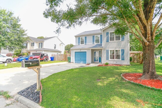 Building Photo - Modern Comfort in a Peaceful Setting – 4BR...