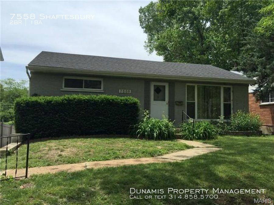 Primary Photo - Cute bungalow with hardwood floors