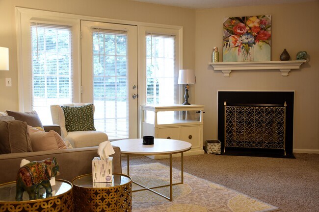 Furnished Living Room with Fireplace - 7123 W Friendly Ave