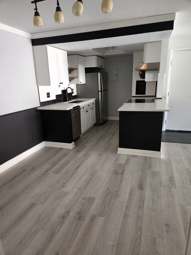 Black and white design - 14161 E Jewell Ave